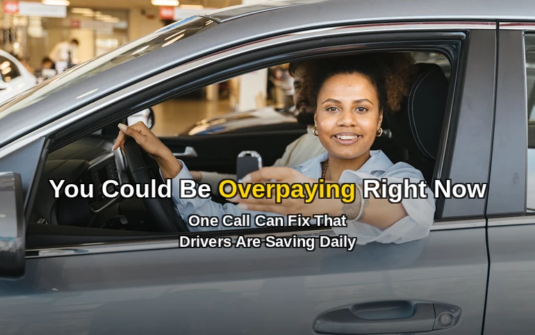 Woman in red car waving