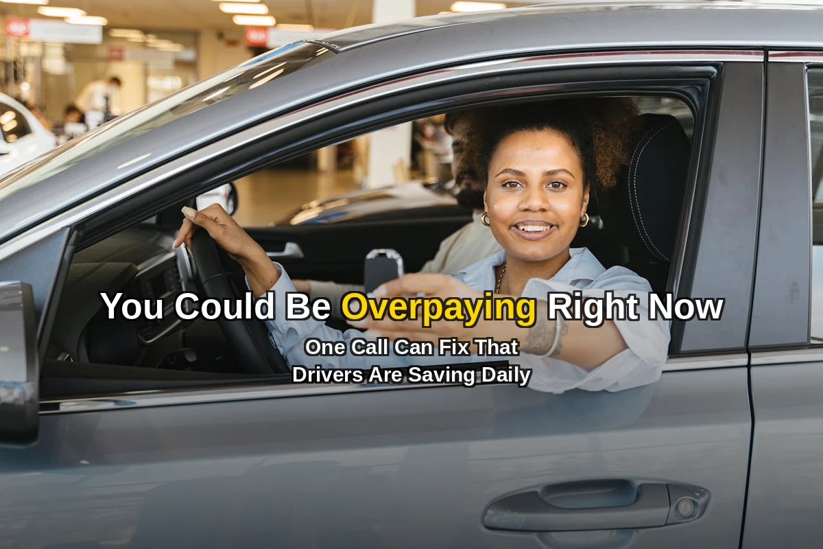 Woman in red car waving